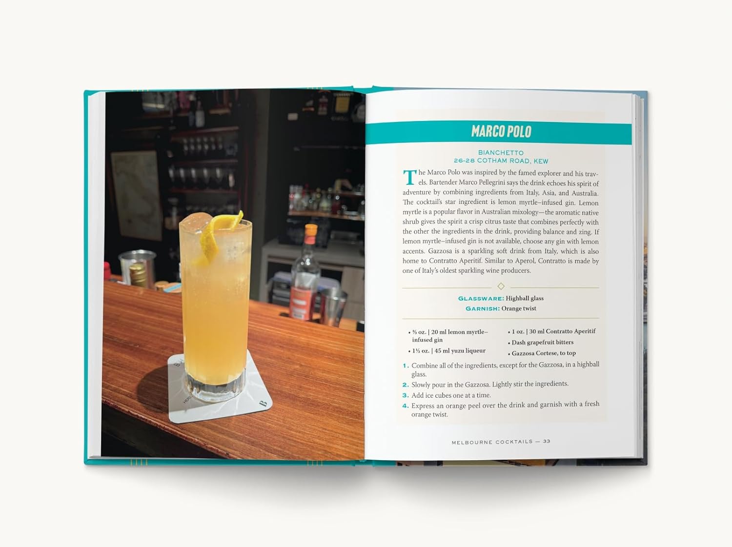Open book showing a cocktail recipe with a drink on a coaster
