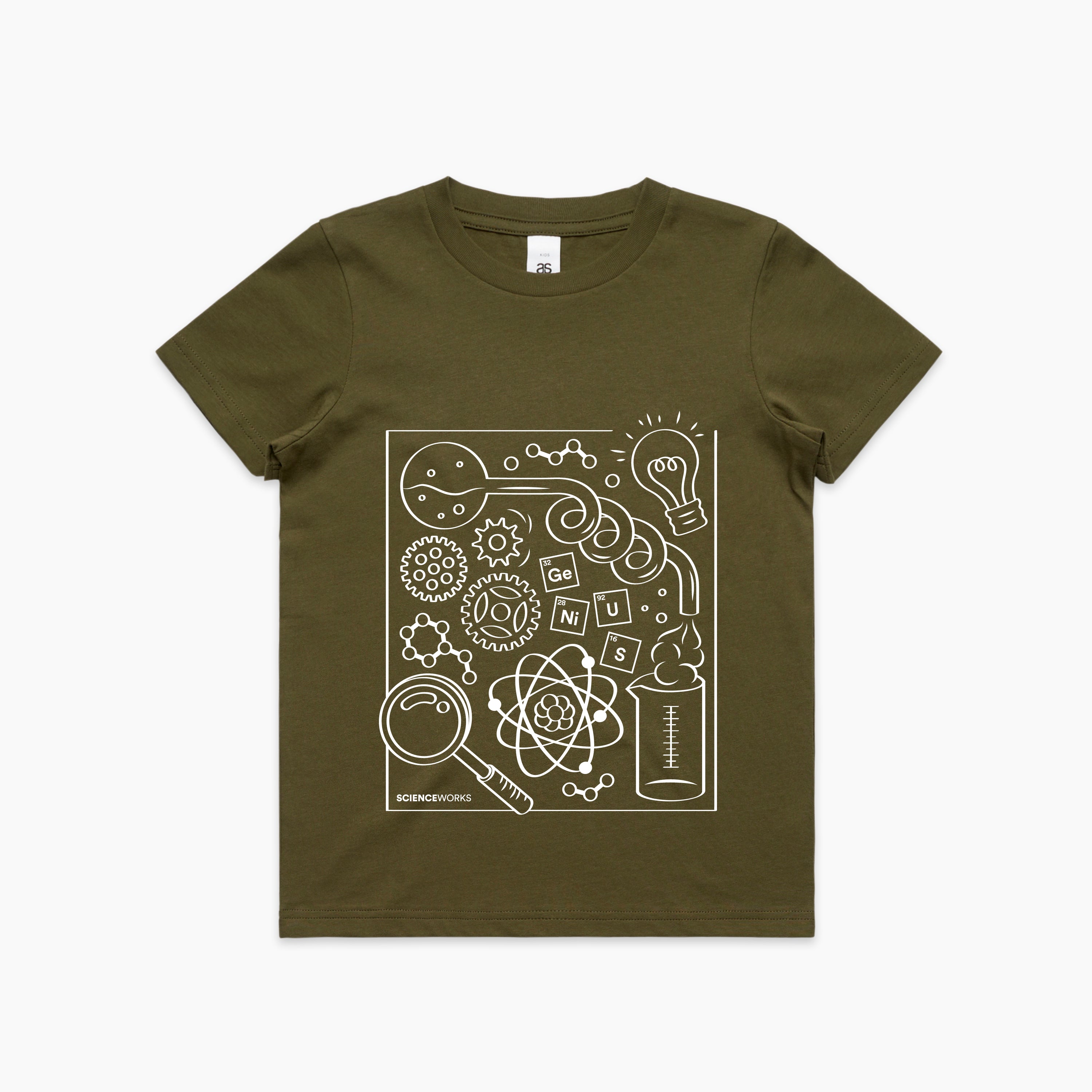 A khaki green kids tshirt with an all white illustration on the centre front. Beakers, atoms, a lightbulb, gears, and a magnifying glass are floating through the image, with elements spelling Genius in the centre. Scienceworks is written in small font at the bottom left of the image.